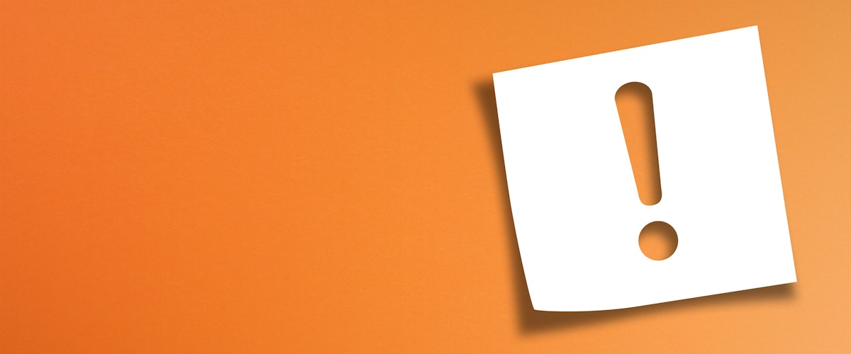 an exclamation mark on an orange background